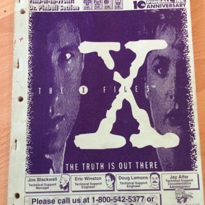 Sega X-Files pinball operations manual purple cover with two investigators and large X logo 1997